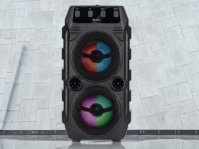 Zwarte Bluetooth-luidspreker met twee lampjes en bedieningselementen.