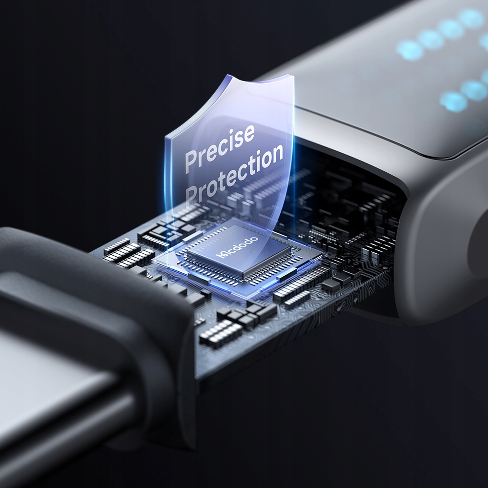 Bir çip üzerinde "Precise Protection" kalkanı olan devre kartının yakın çekimi.