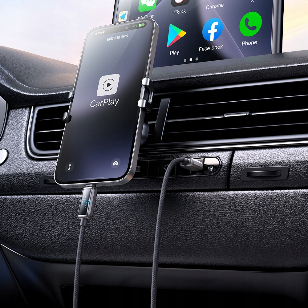 CarPlay'li bir akıllı telefon, bir arabanın havalandırmasına monte edilmiş ve şarj oluyor.