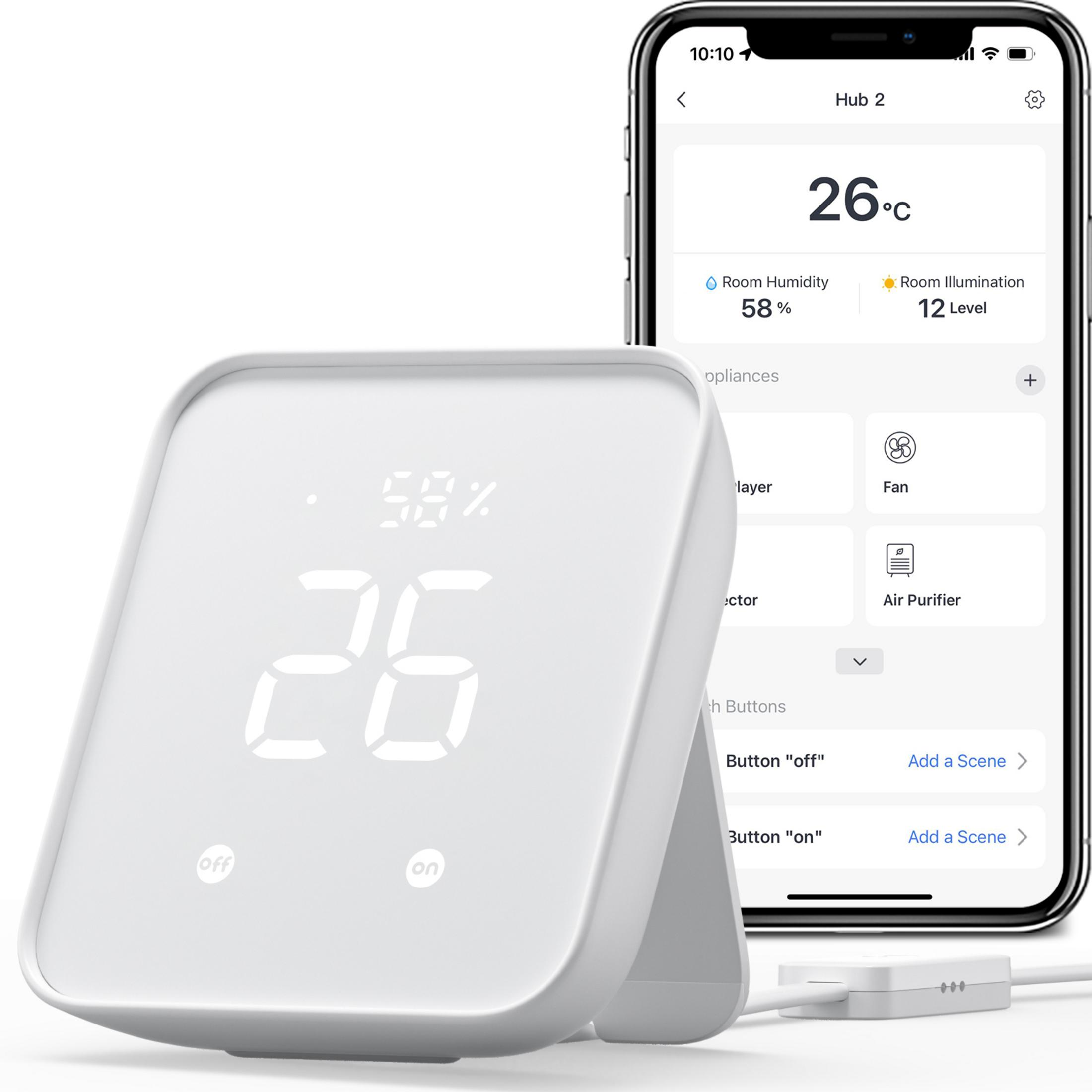 Ein weißes digitales Thermometer zeigt 26°C an, daneben ein Smartphone mit einer App.