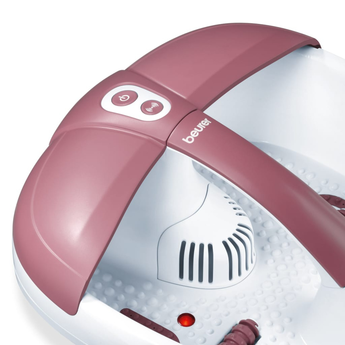 Ein rosafarbener Fußsprudel mit Beurer-Logo, Ein-/Aus-Schalter und Vibrationssymbol.