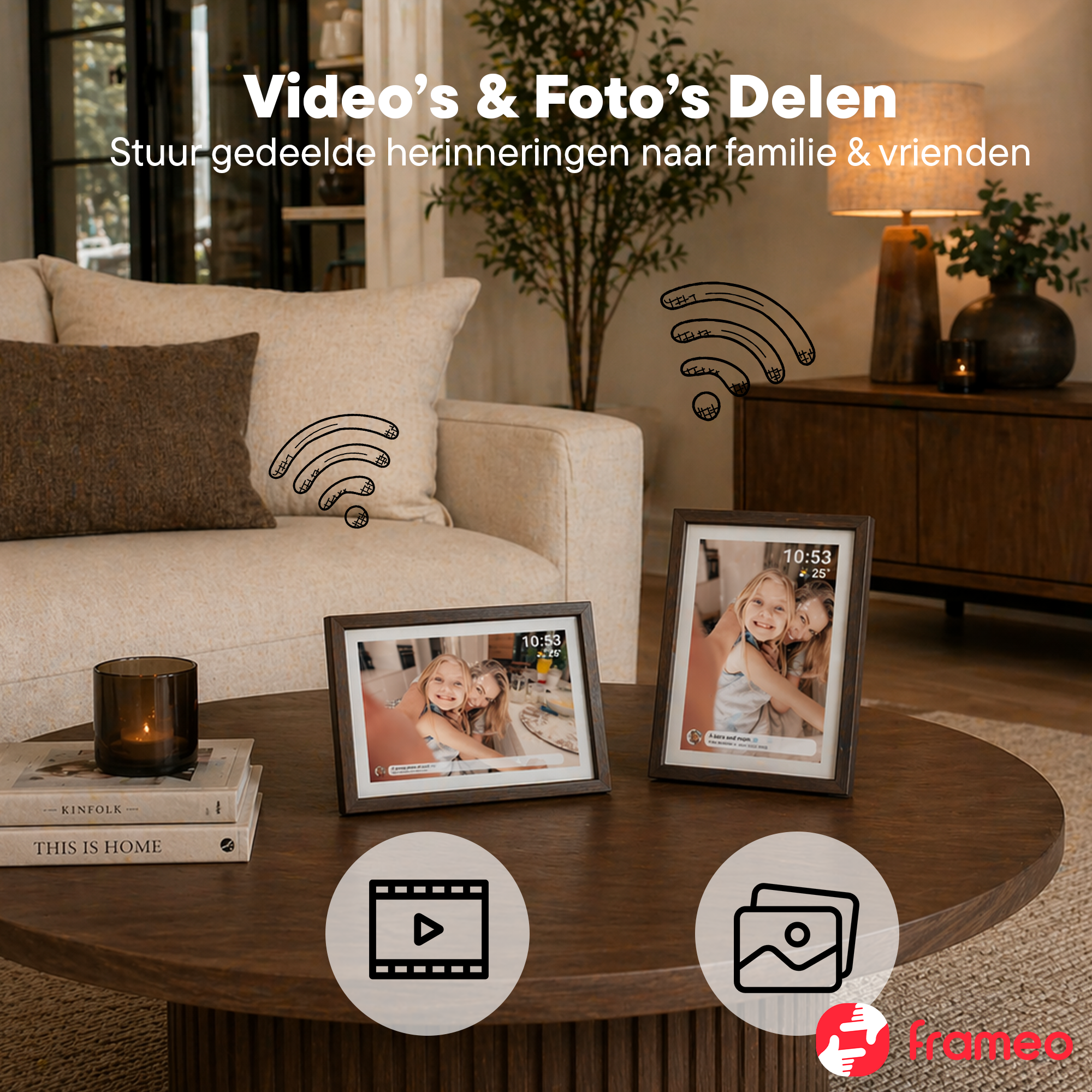 Two digital picture frames display family photos on a wooden table.