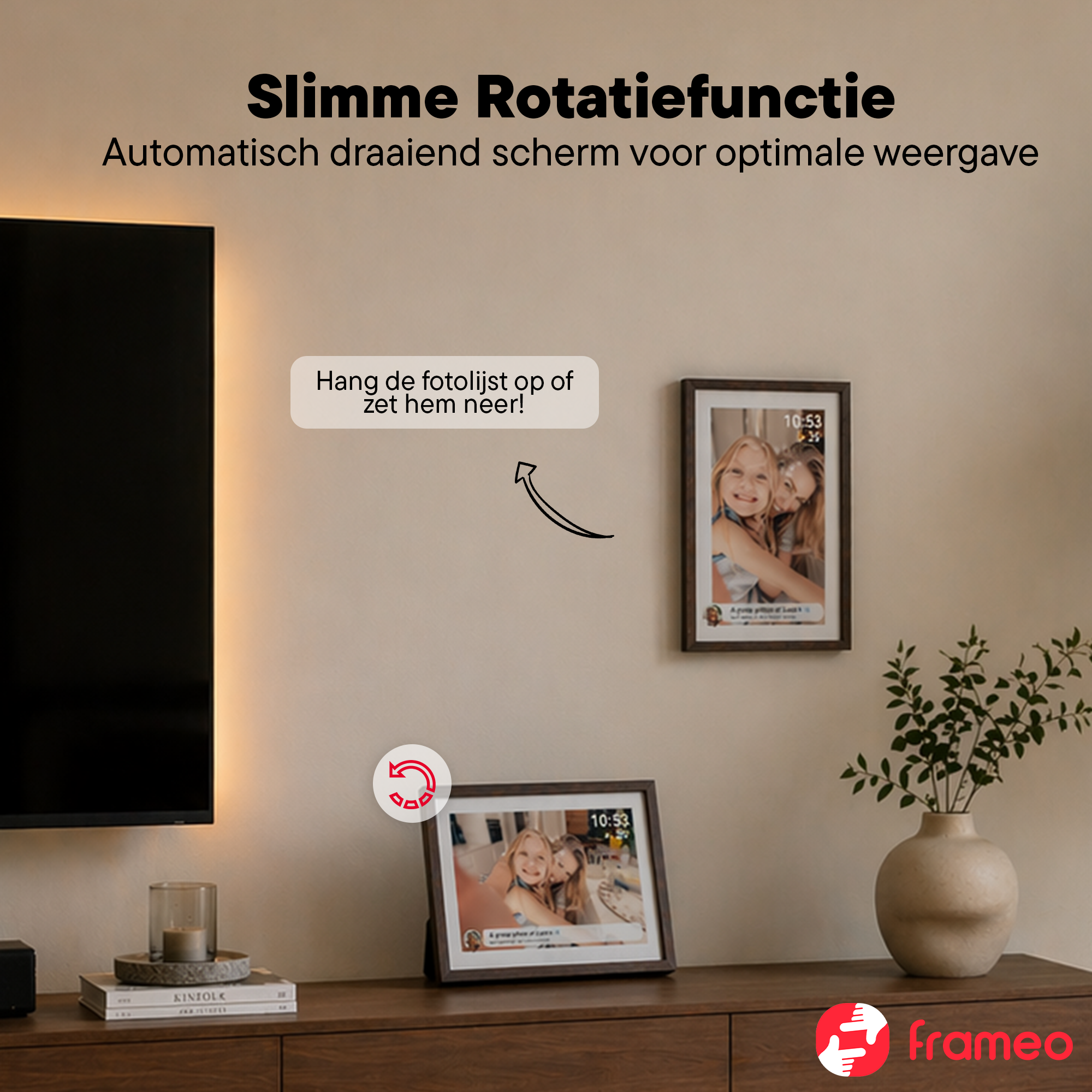 A digital photo frame shows two smiling girls. Another hangs on the wall.