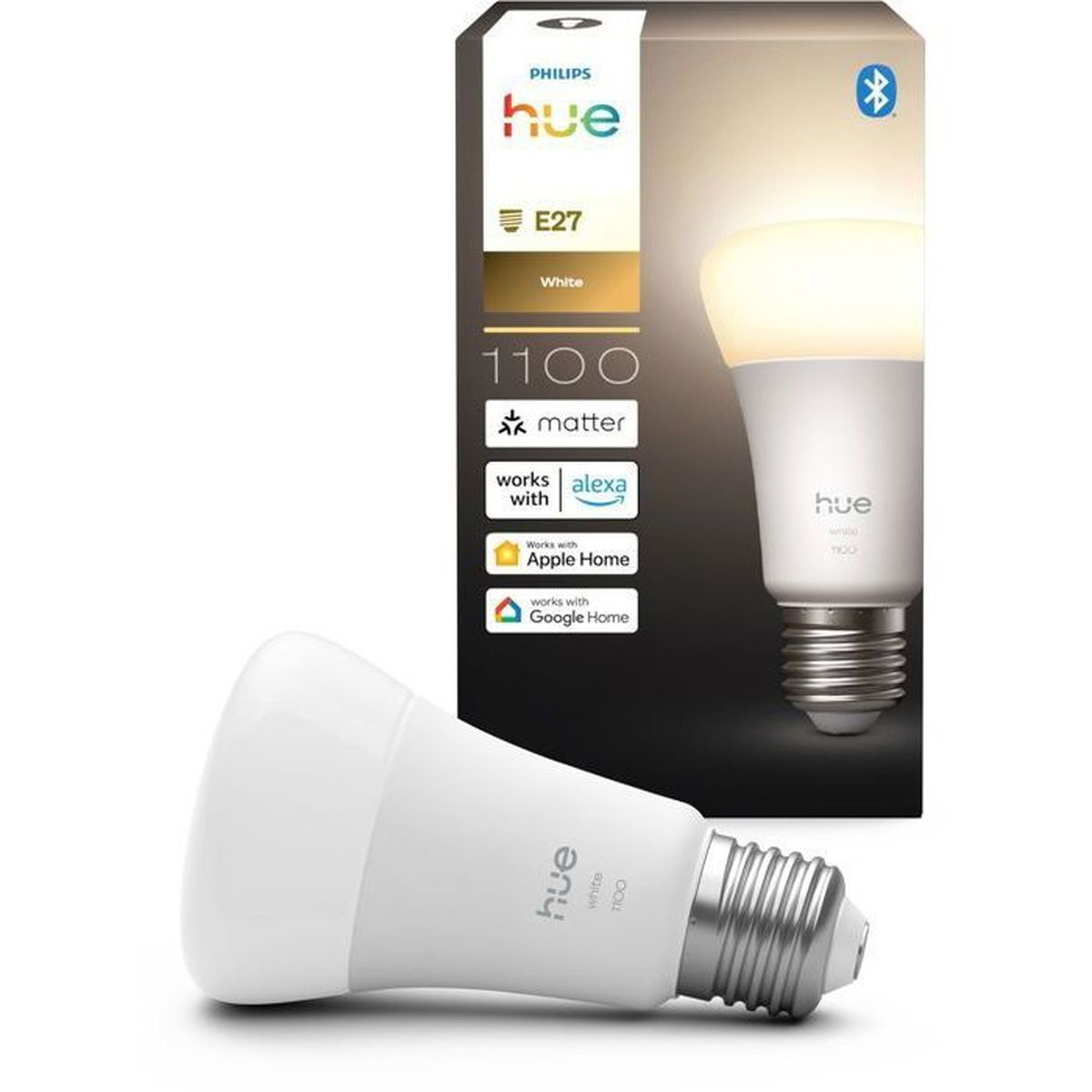 Una lampadina Philips Hue E27 bianca giace accanto alla sua confezione.