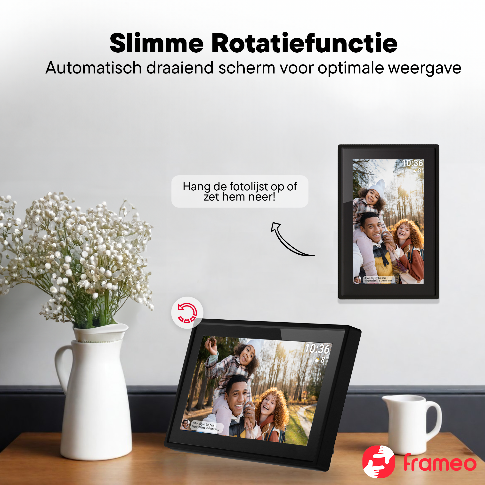 A digital photo frame shows a family in the woods. A jug and flowers are beside it.