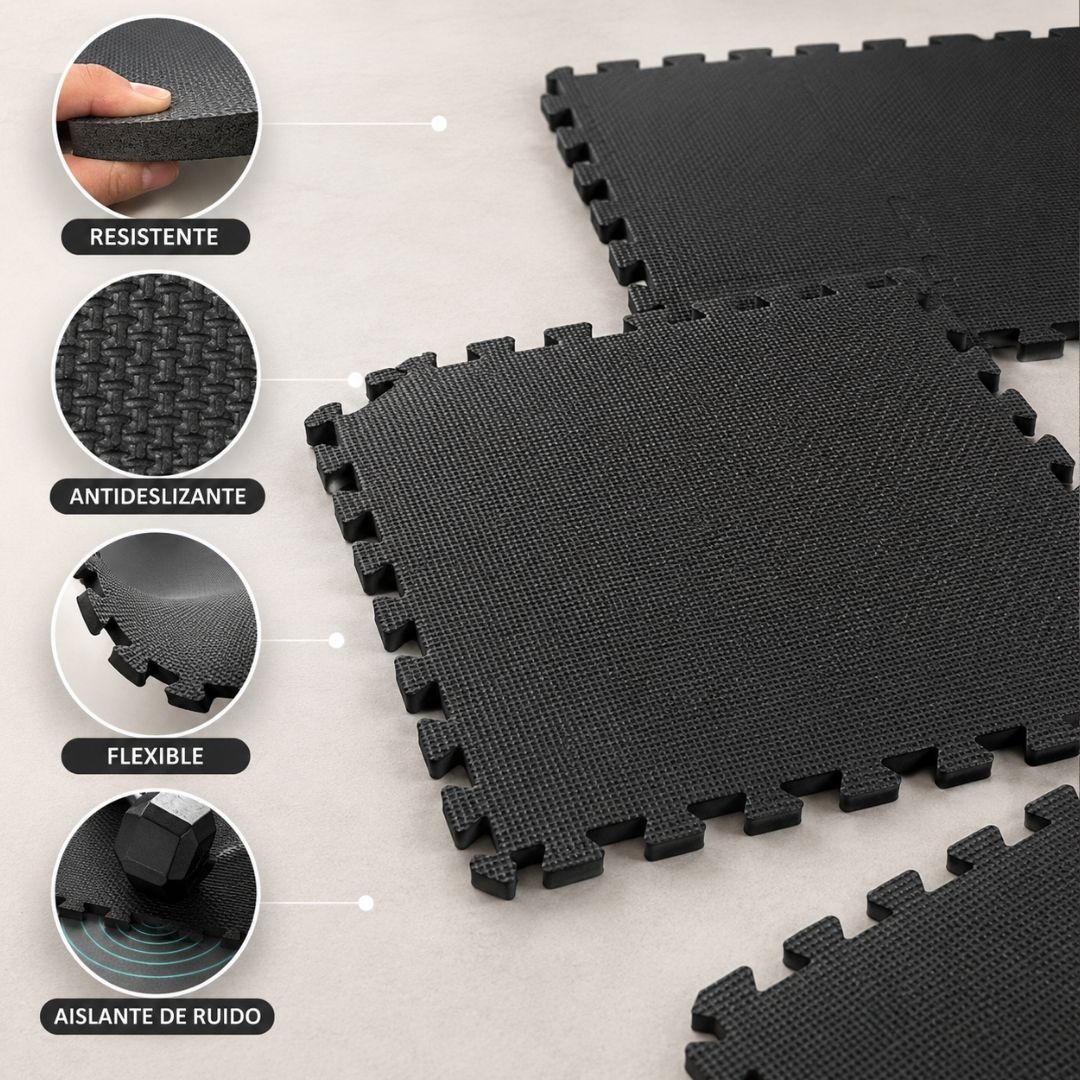 Tapetes de piso negras entrelazadas sobre una superficie gris claro.
