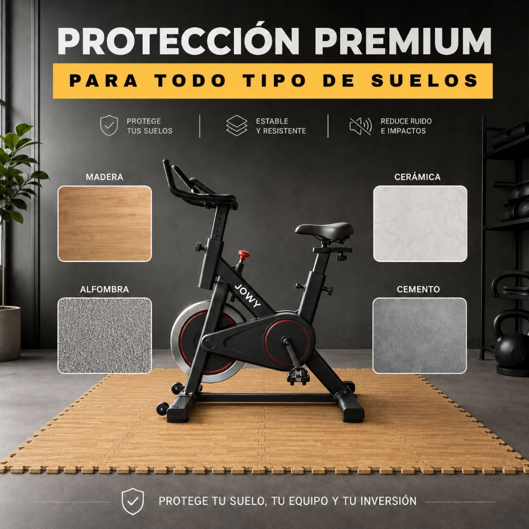 Una bicicleta estática negra sobre una alfombra. Muestras de madera y alfombra a la izquierda.