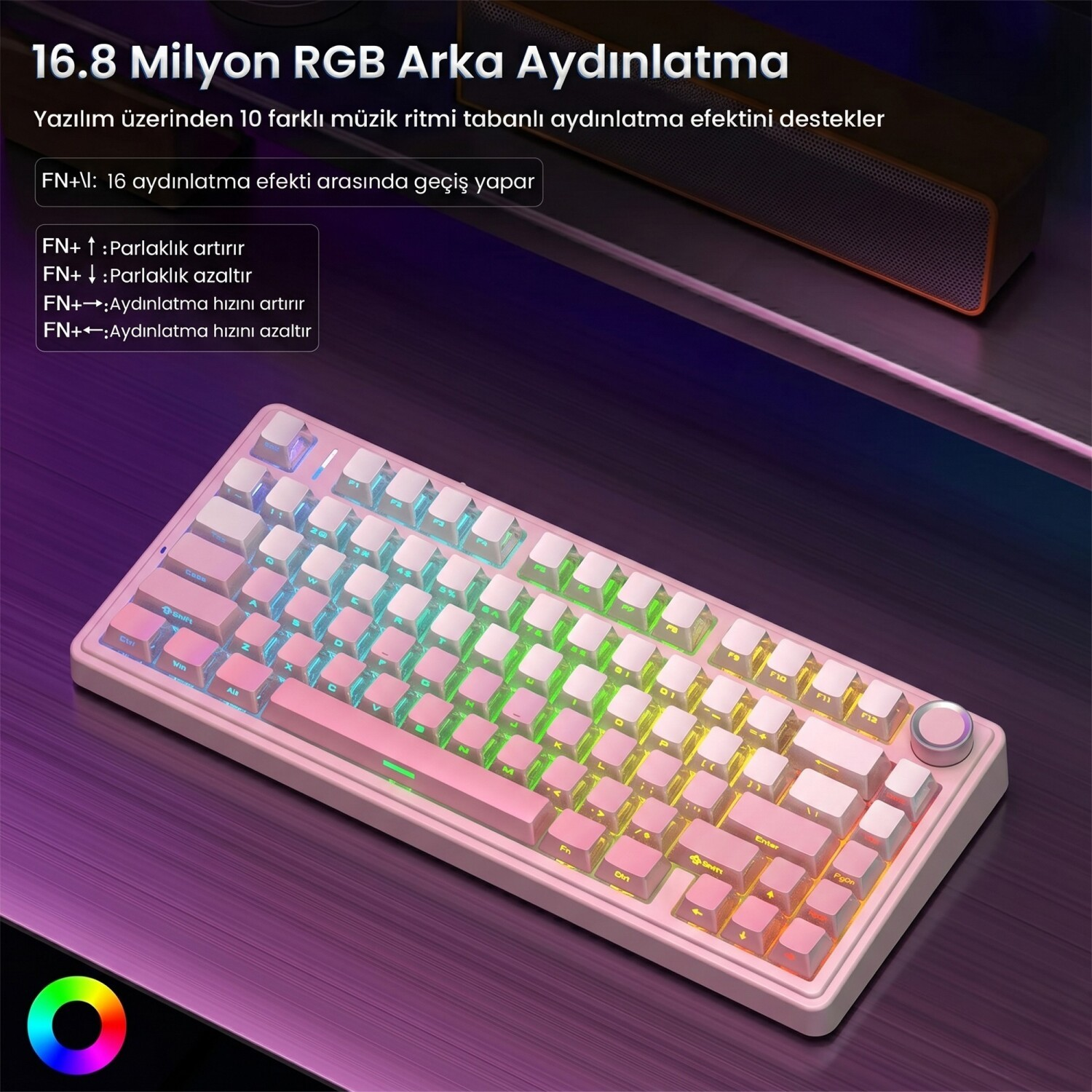 Masa üzerinde RGB aydınlatmalı pembe mekanik klavye.