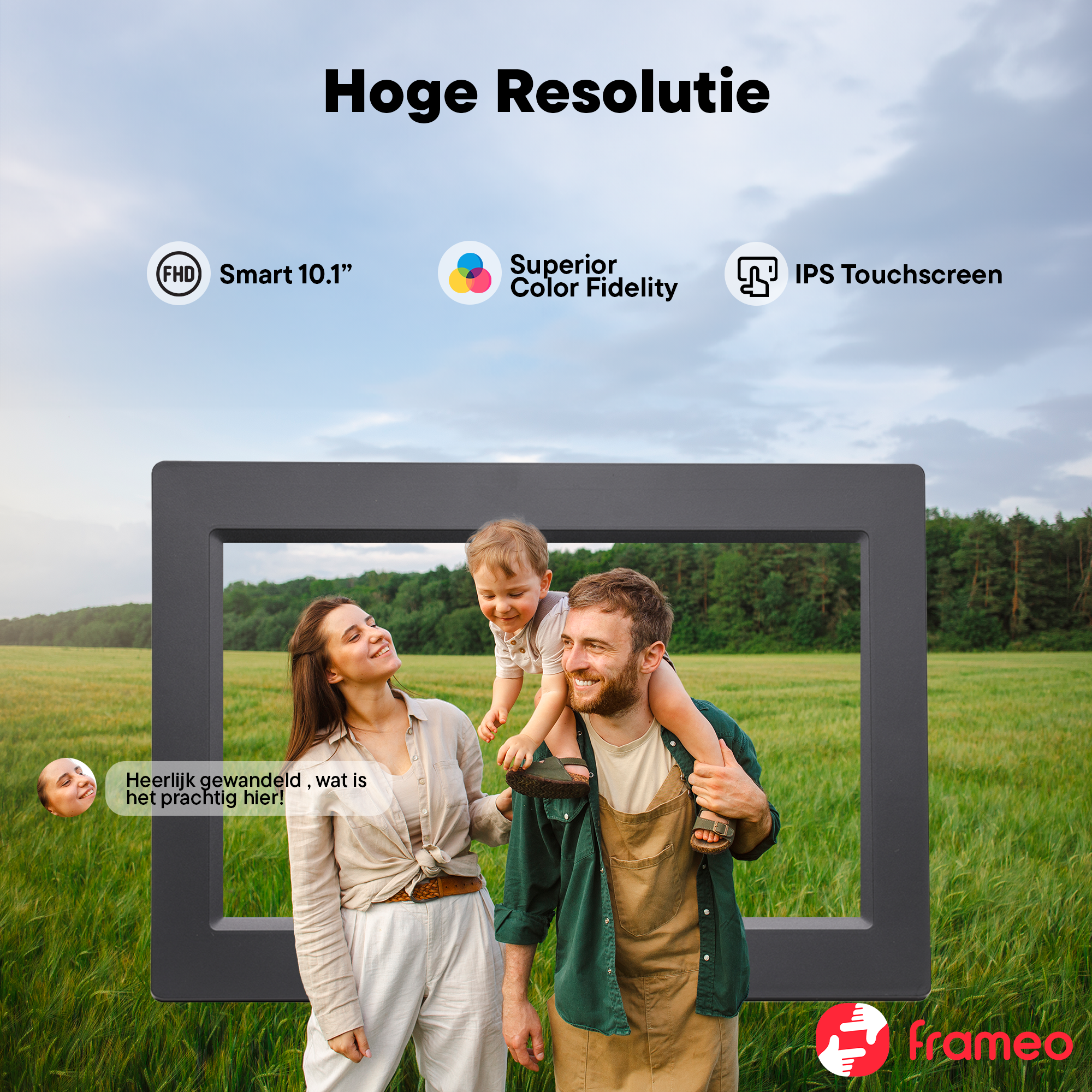 A family in a field, framed by a digital photo frame displaying the scene.