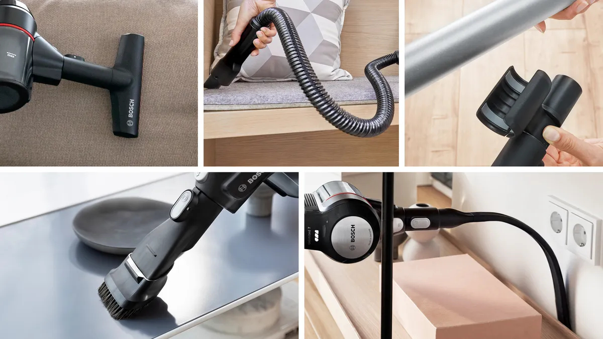 Primo piano di un aspirapolvere Bosch nero con accessori su varie superfici.