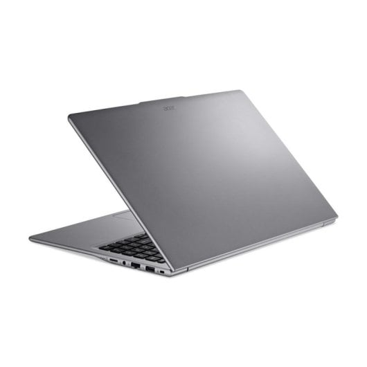 Un portátil Acer gris cerrado que muestra el teclado y los puertos.