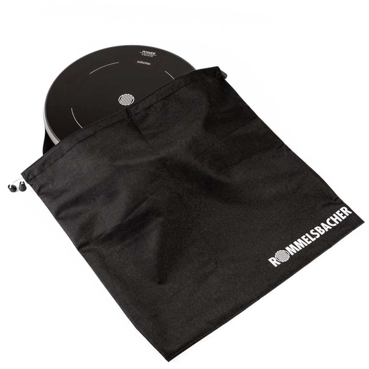 Sac noir à cordon avec une plaque à induction ronde partiellement à l'intérieur.