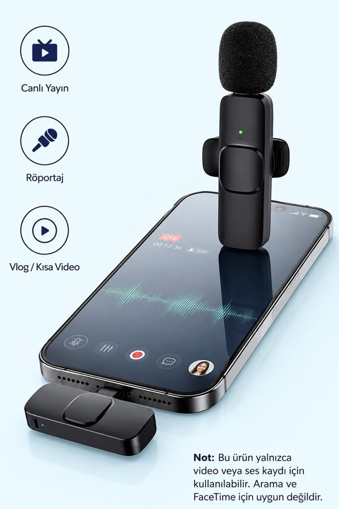 Dalga formu gösteren bir akıllı telefonun üzerinde siyah bir mikrofon duruyor.
