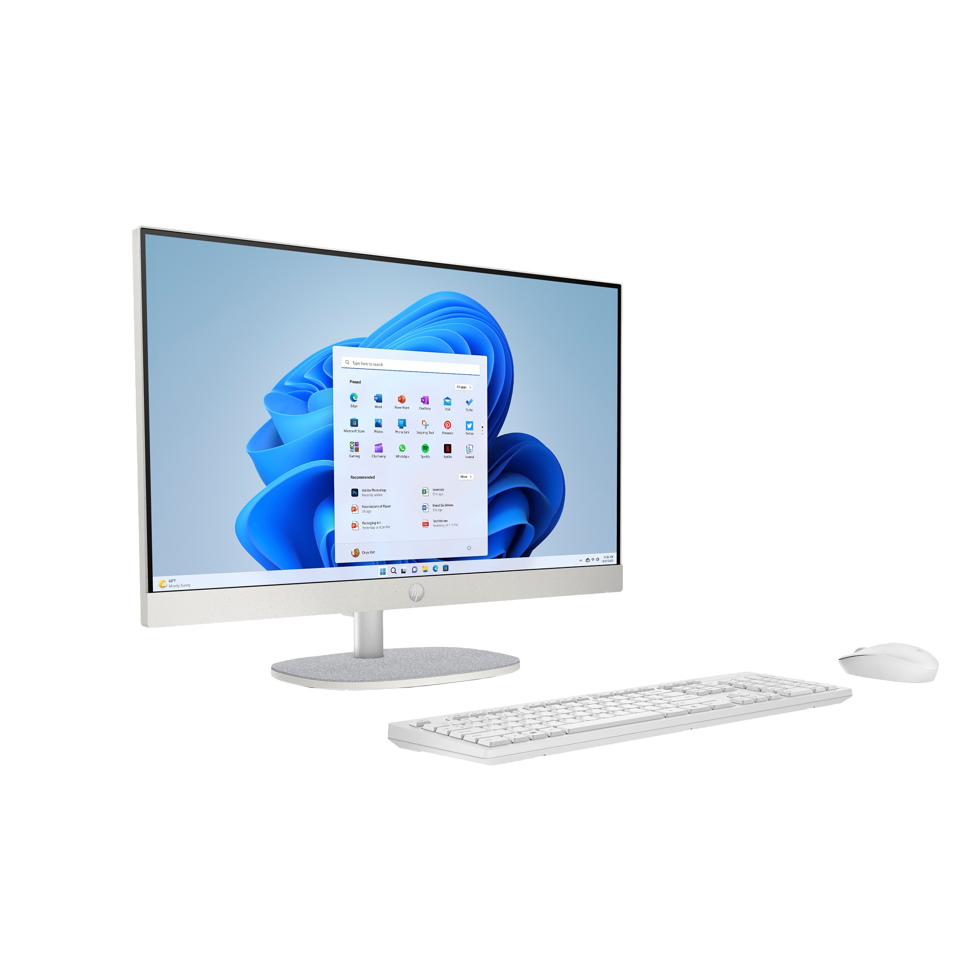 Un ordenador todo en uno blanco con teclado y ratón sobre fondo blanco.