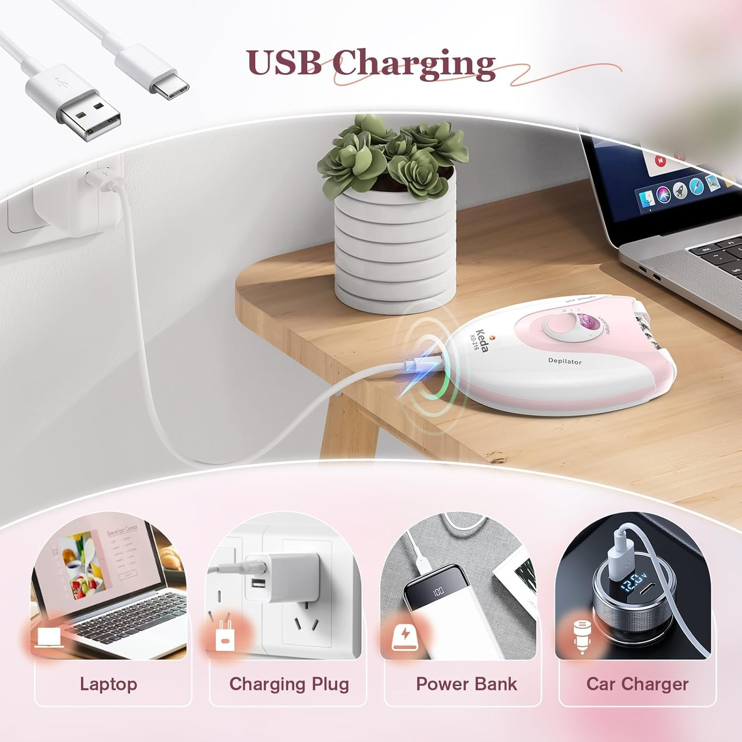 Ein rosa und weißer Epilierer wird über USB geladen, neben einem Laptop und einer Pflanze.