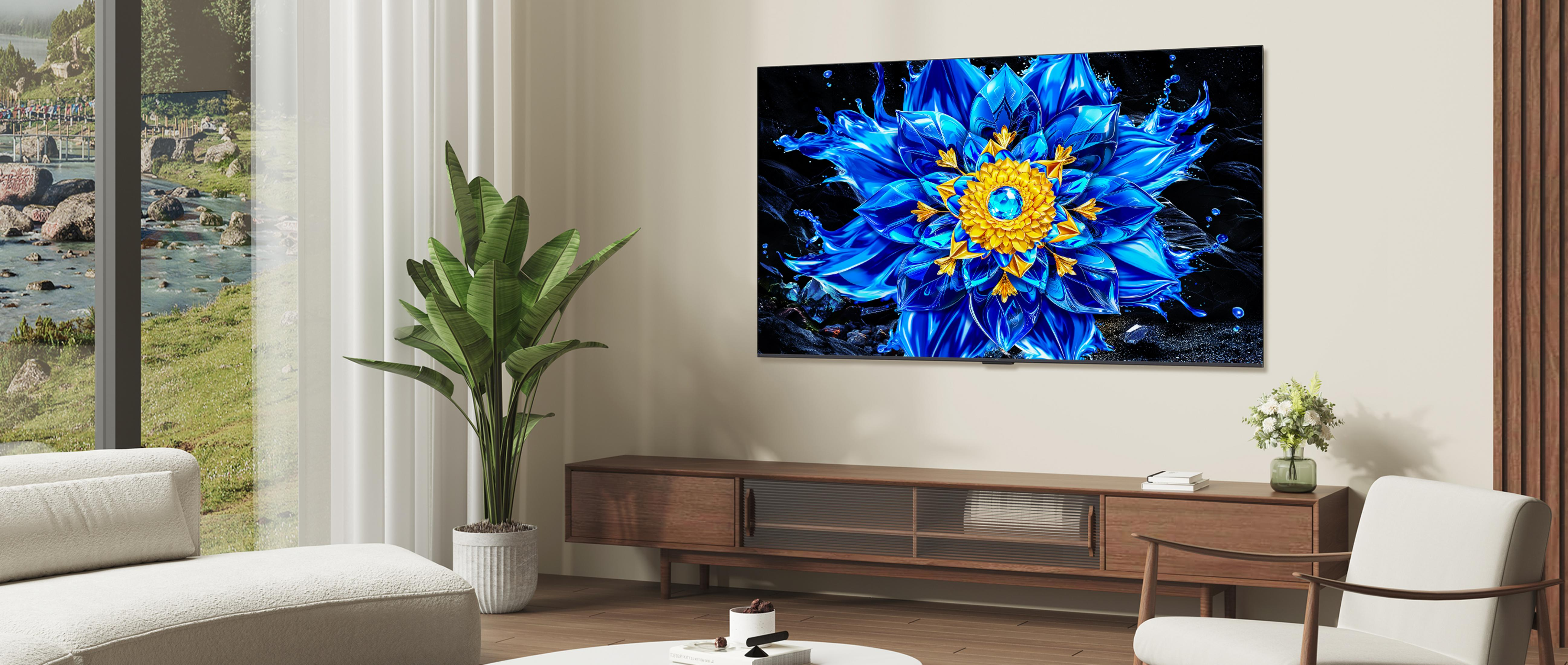 Una sala de estar elegante con un televisor que muestra una flor azul.