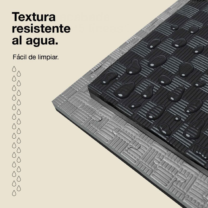 Tapetes de rompecabezas negros y grises con gotas de agua en el tapete negro.