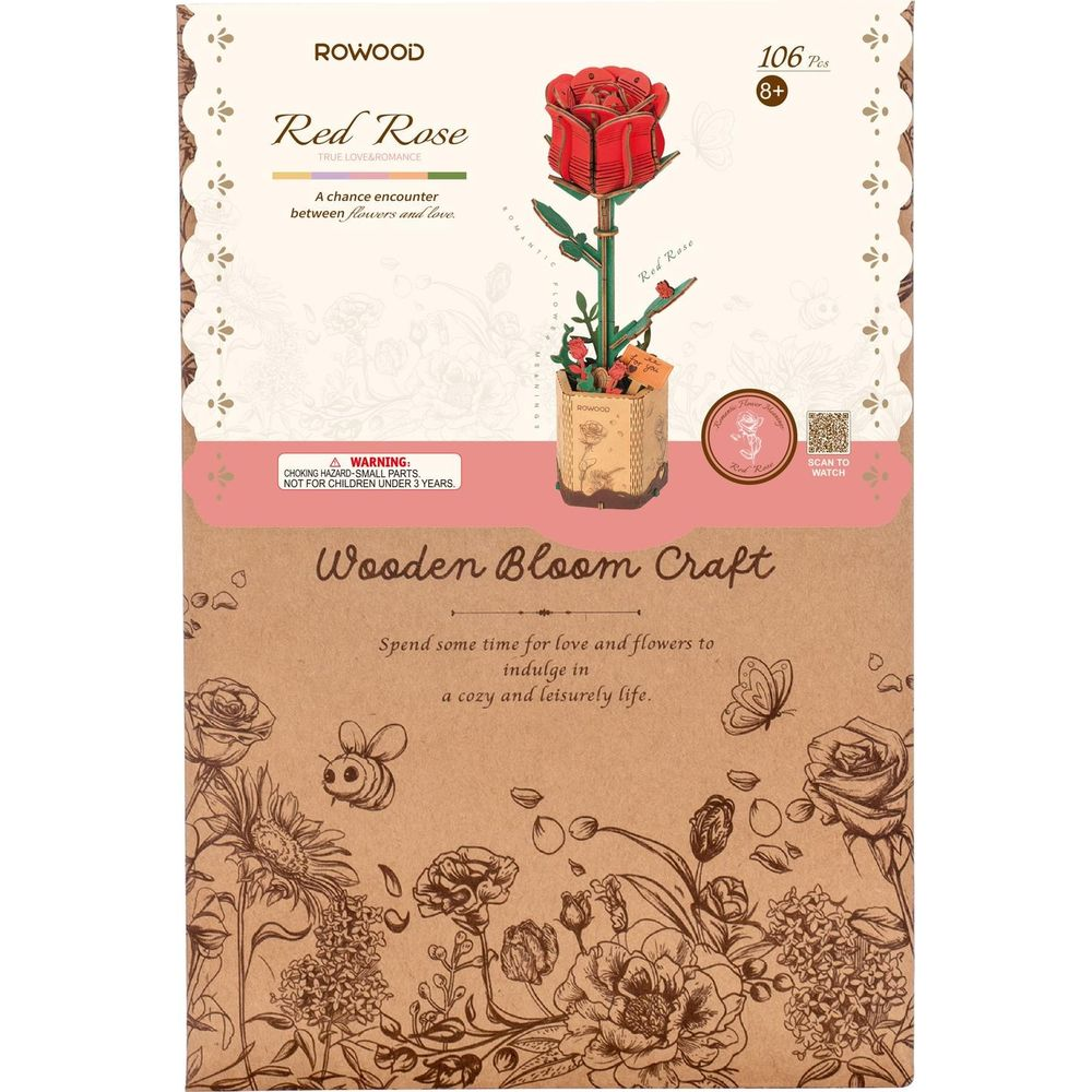 Emballage d'un modèle de rose rouge en bois avec des détails floraux et d'insectes.