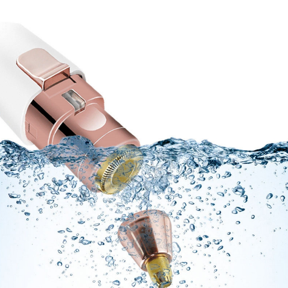 Ein goldener Rasierkopf und eine roségoldene Kappe tauchen in sprudelndes Wasser ein.