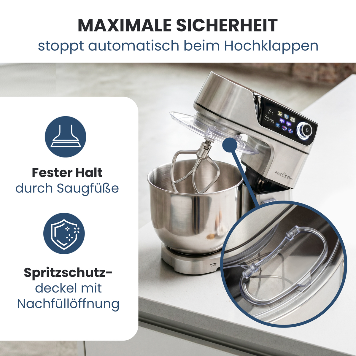 Edelstahl-Küchenmaschine mit Rührschüssel und Spritzschutz.