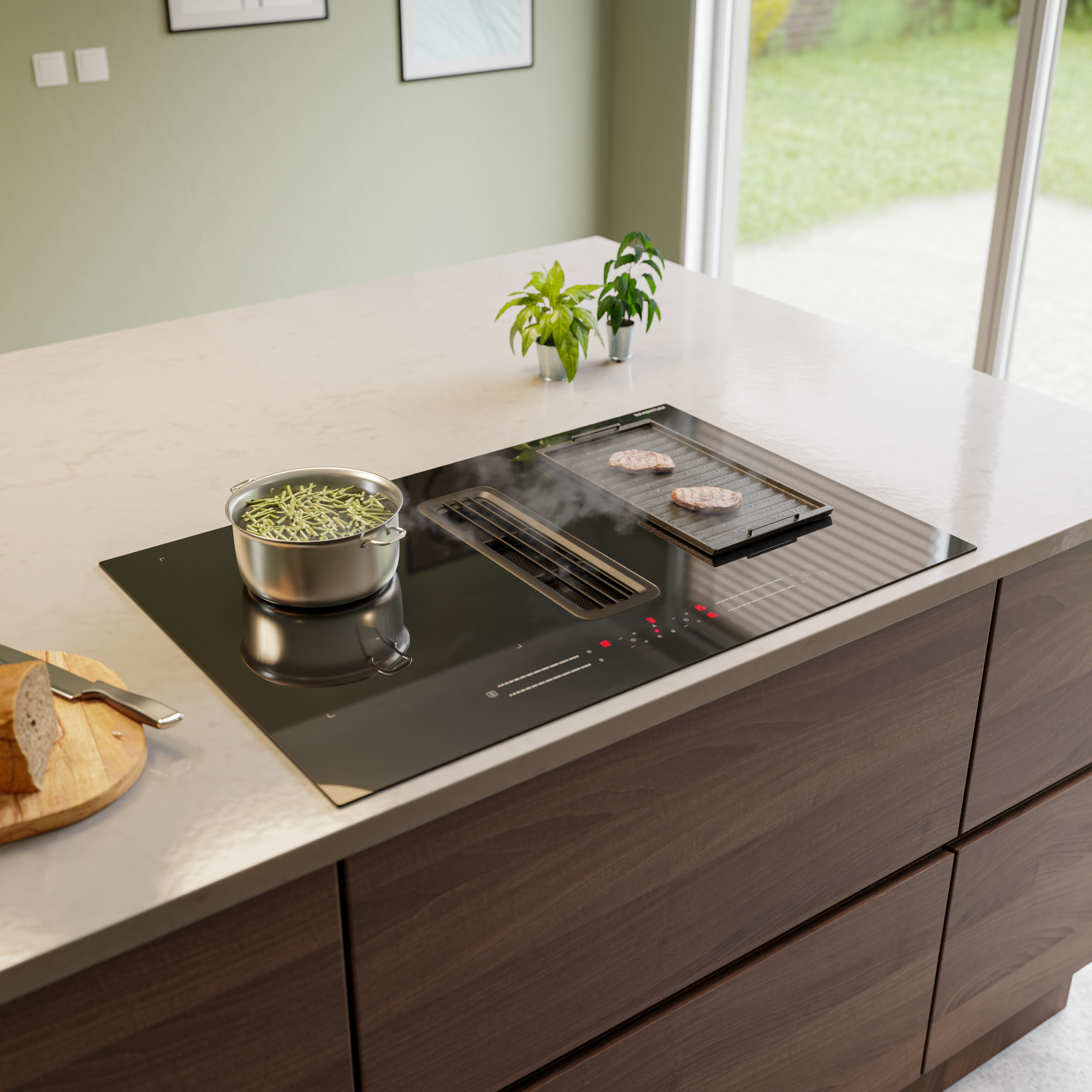 Un îlot de cuisine moderne avec plaque à induction, grill, hotte escamotable, casserole de pâtes et pain.