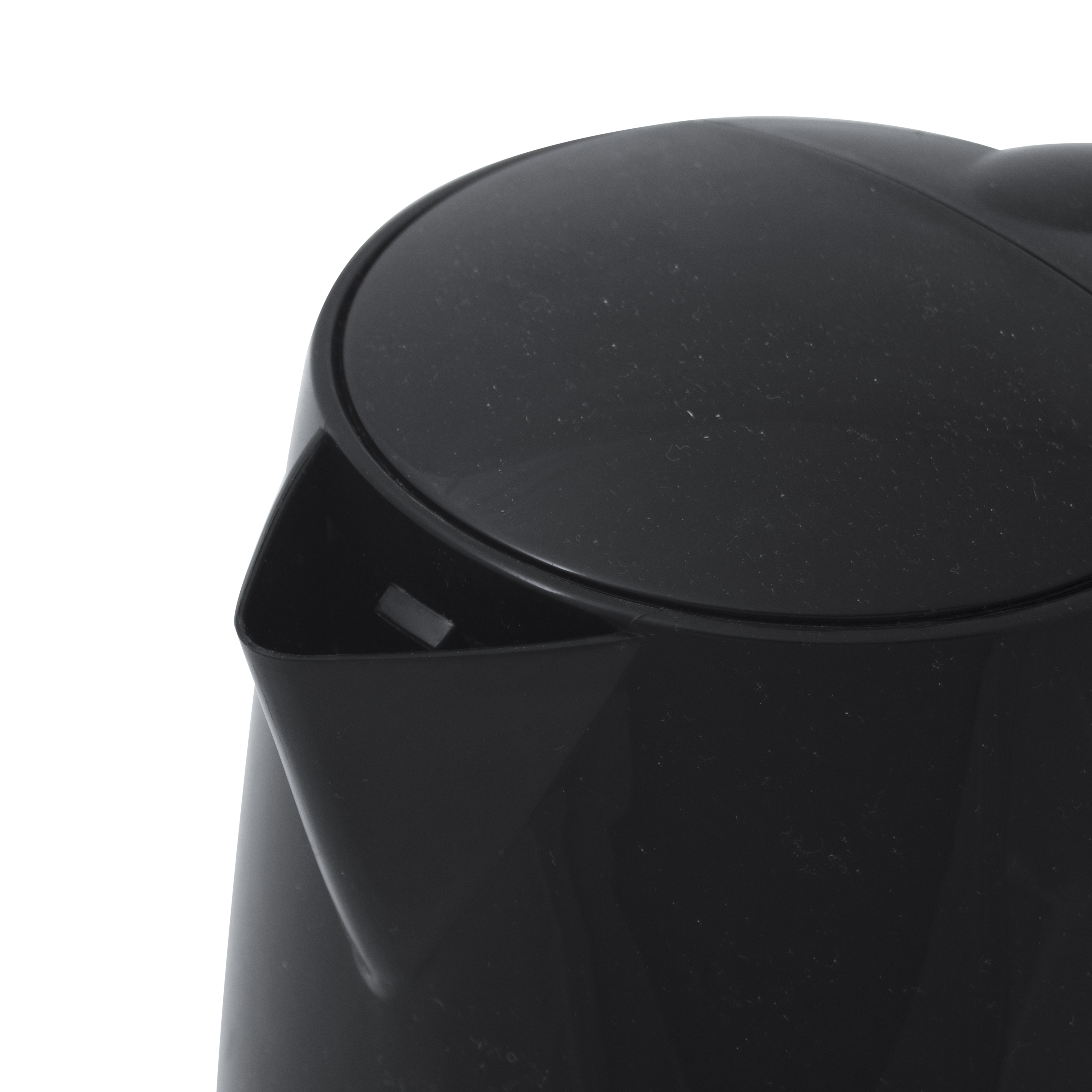 Close-up of a black kettle, showing spout and lid, against a white background.