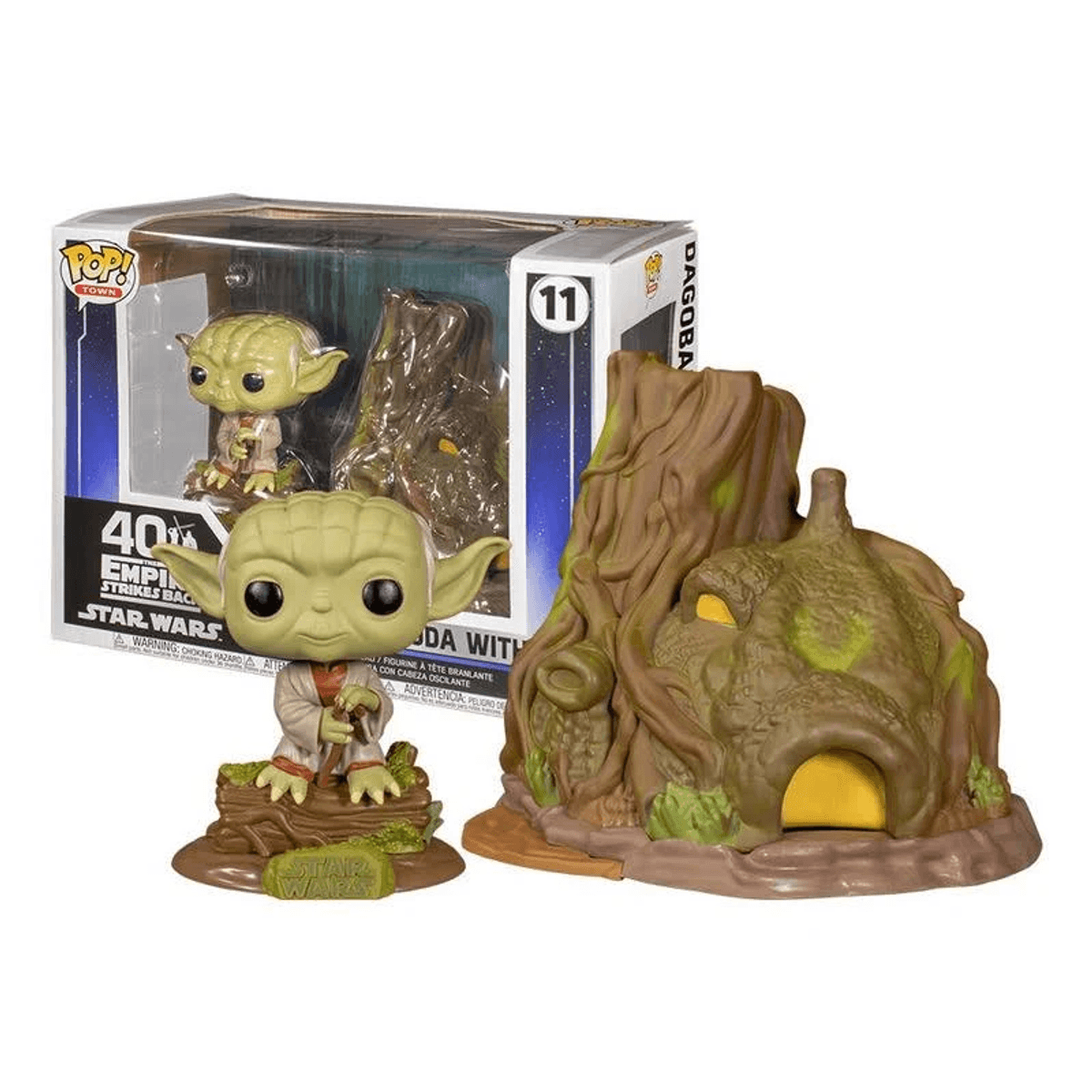 Statua di Yoda con sfondo casa sull'albero di Dagobah.