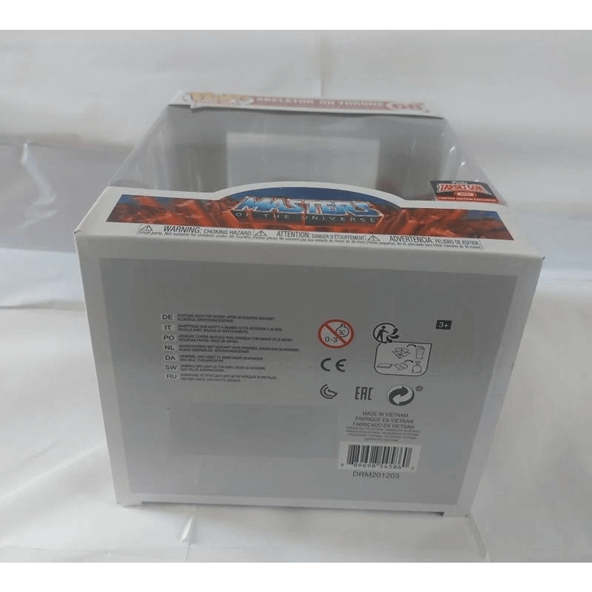 Caja Funko Pop Masters of the Universe con advertencias y texto multilingüe.