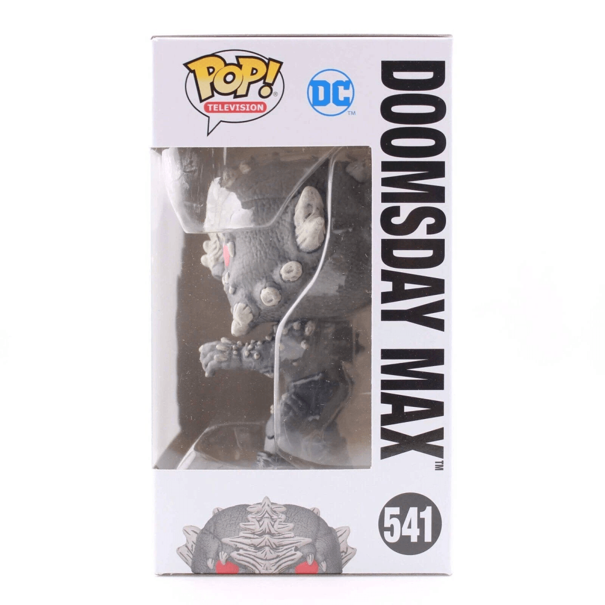 Graue Funko Pop!-Figur von Doomsday Max in Verpackung, DC Comics Logo.