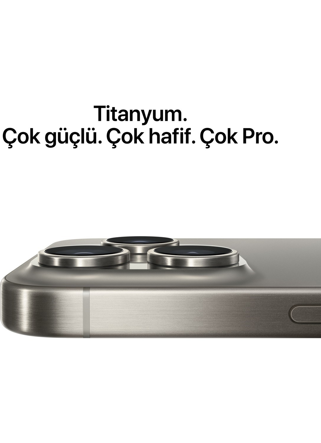 Üç kamera lensli gri iPhone ve metin yakın çekimi.