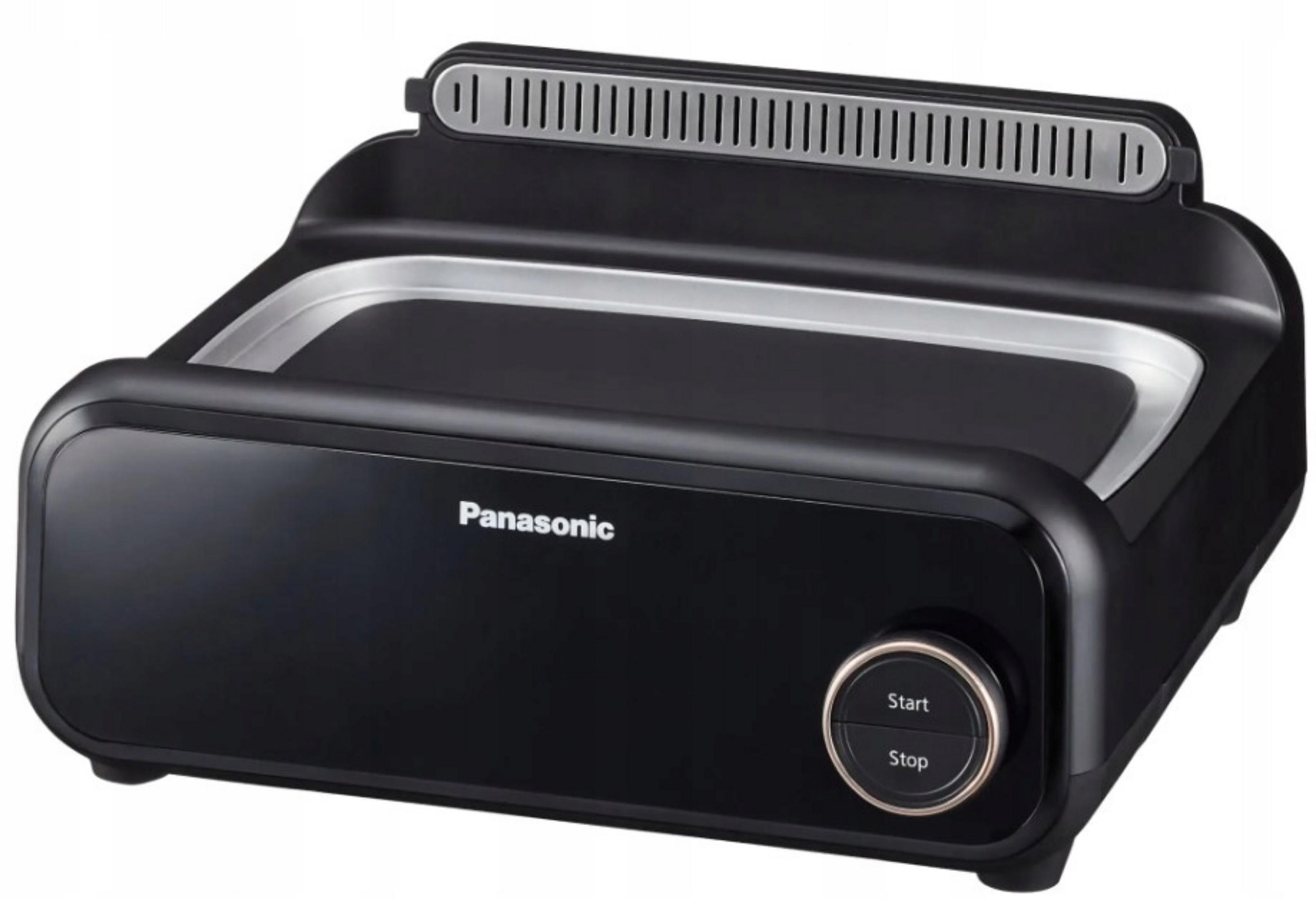 Una griglia da tavolo Panasonic nera con finiture argentate e pulsanti.