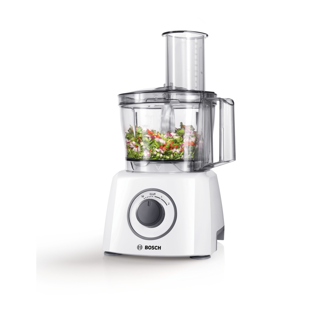 Un robot da cucina Bosch bianco con verdure tritate nella ciotola.