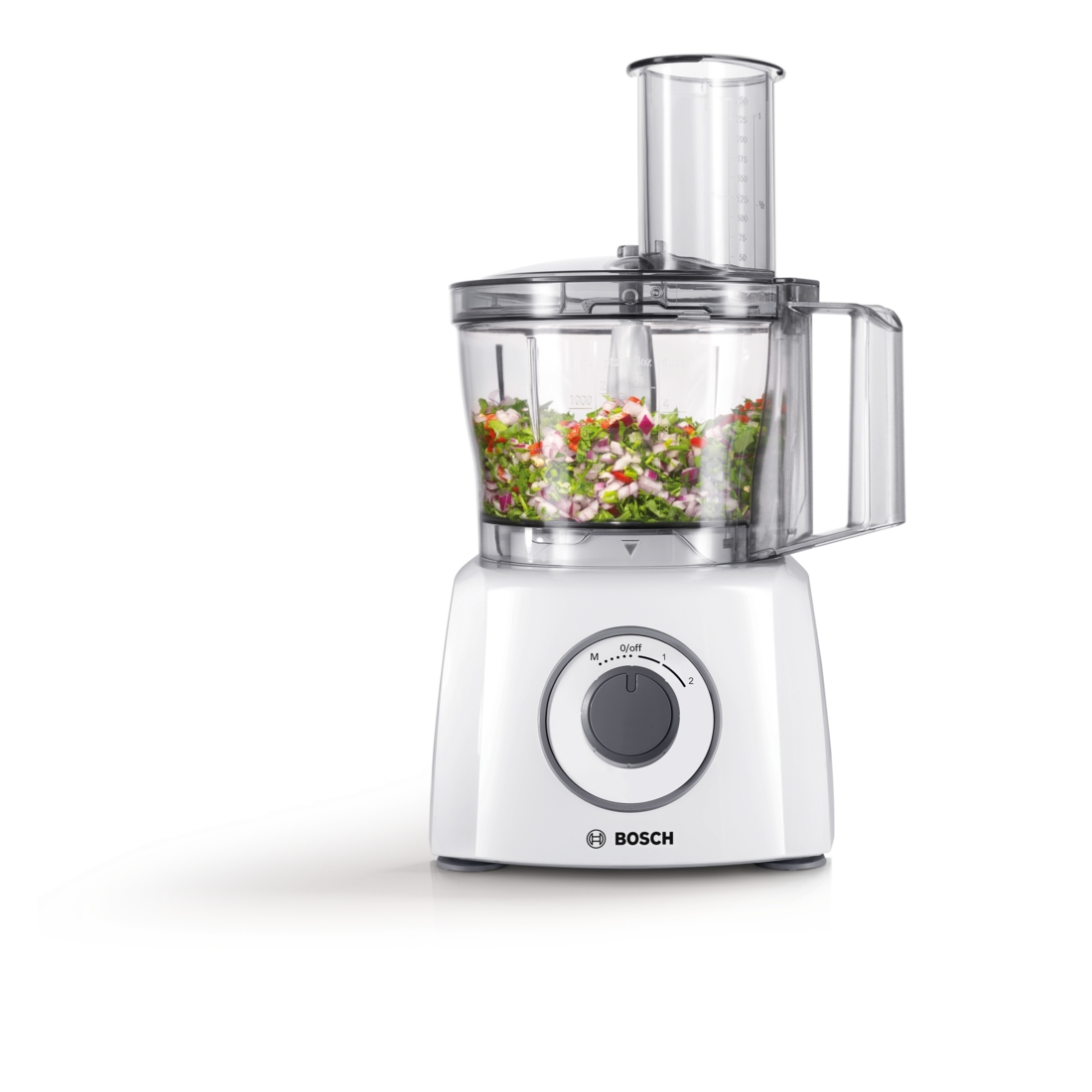 Un robot da cucina Bosch bianco con verdure tritate nel contenitore.