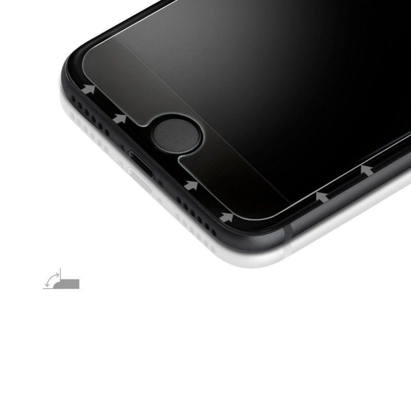 Primo piano di uno smartphone con pellicola protettiva applicata. Frecce indicano i bordi.