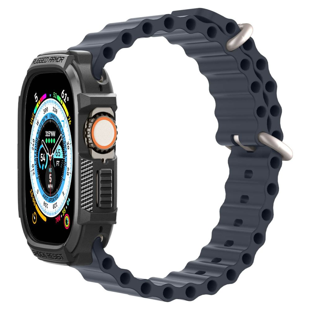 Uno smartwatch grigio scuro con cinturino blu scuro testurizzato, mostra bussola e altitudine.