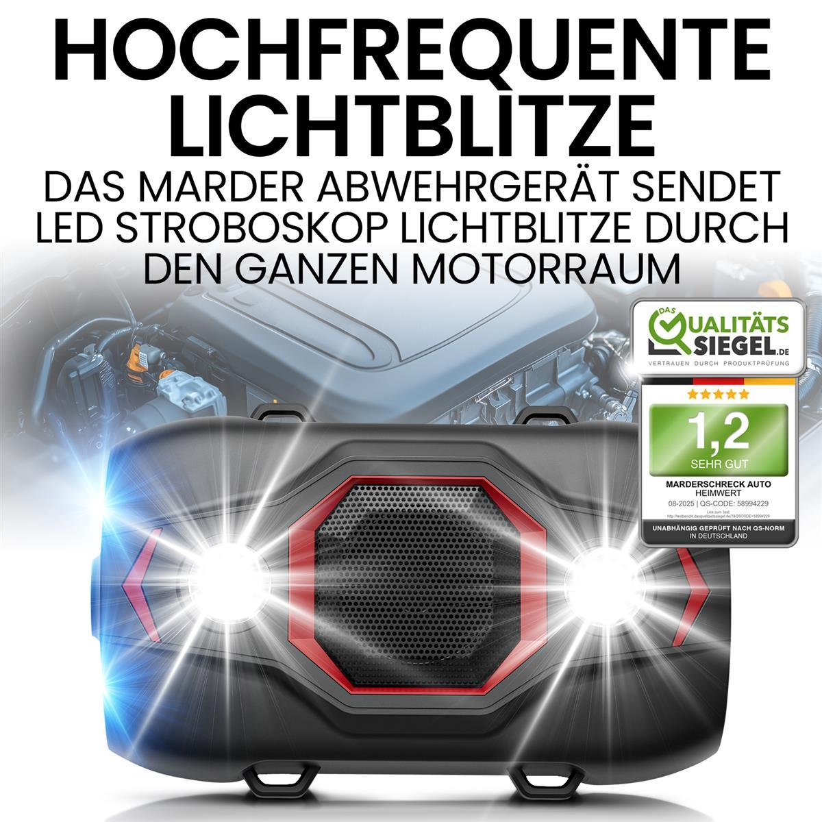Schwarzes Abwehrgerät mit roten Akzenten und zwei hellen LED-Lichtern, vor einem Motorteil.