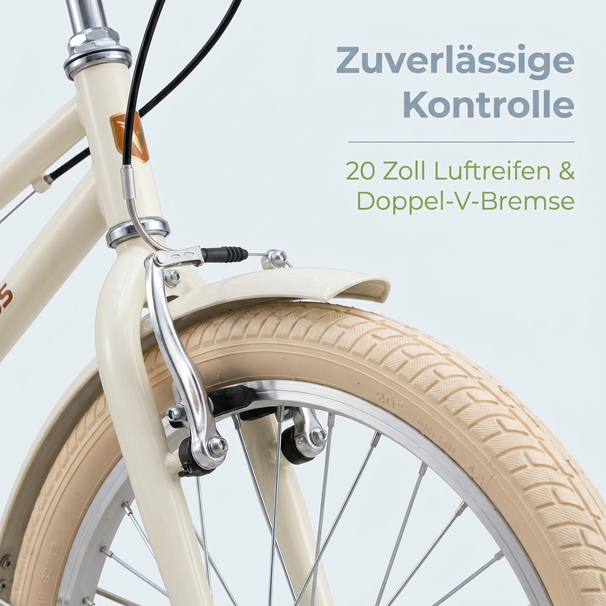 Ein cremefarbener Fahrradrahmen mit 20-Zoll-Reifen und V-Bremsen.