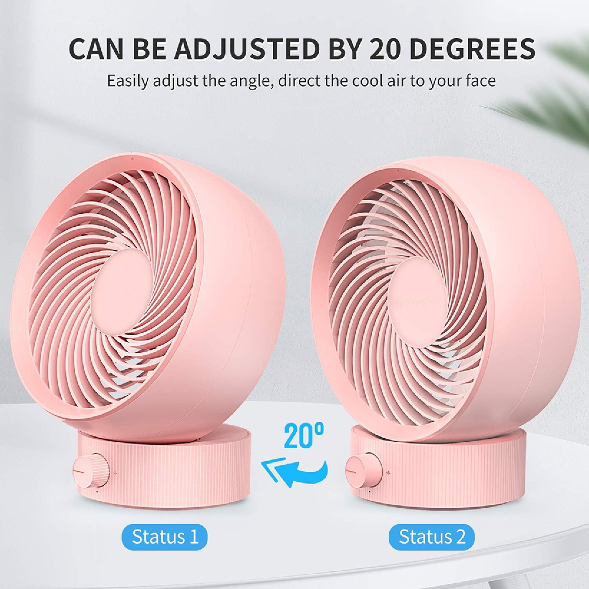 Zwei rosa Ventilatoren, verstellbar um 20 Grad, auf einem Tisch.