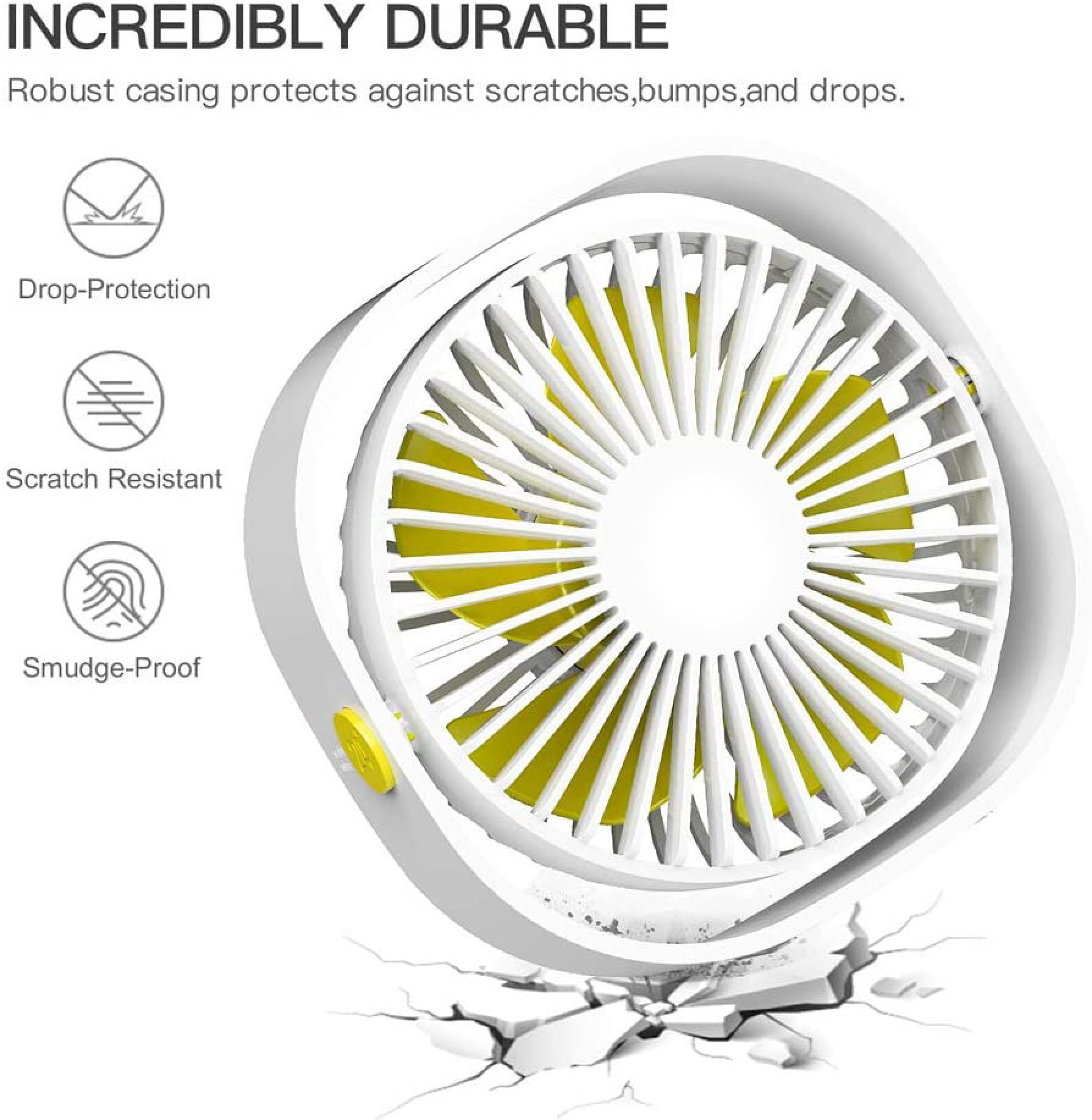 Weißer Ventilator mit gelben Flügeln, der auf rissigen Boden fällt.