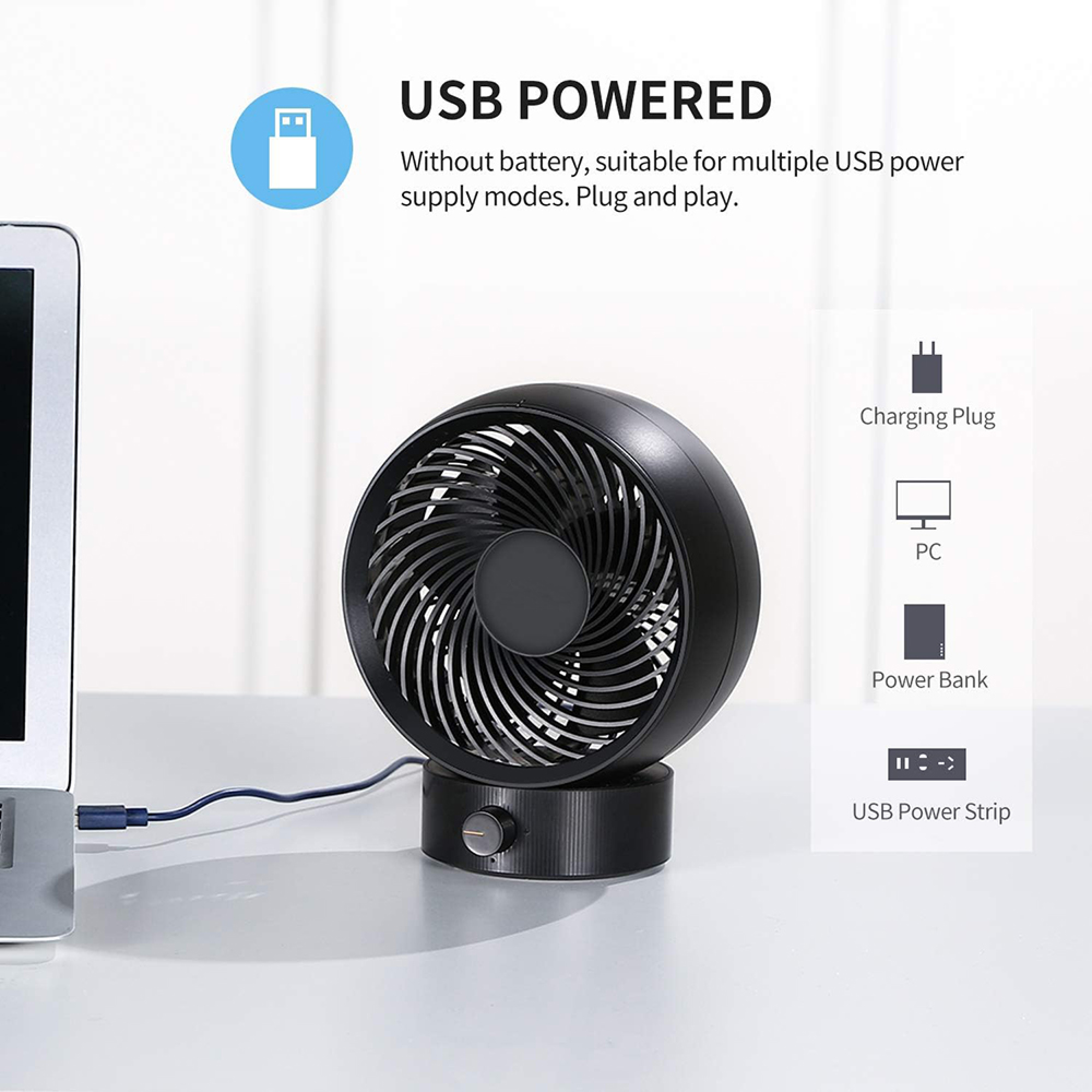 Ein schwarzer USB-Ventilator ist über ein blaues Kabel mit einem Laptop verbunden.