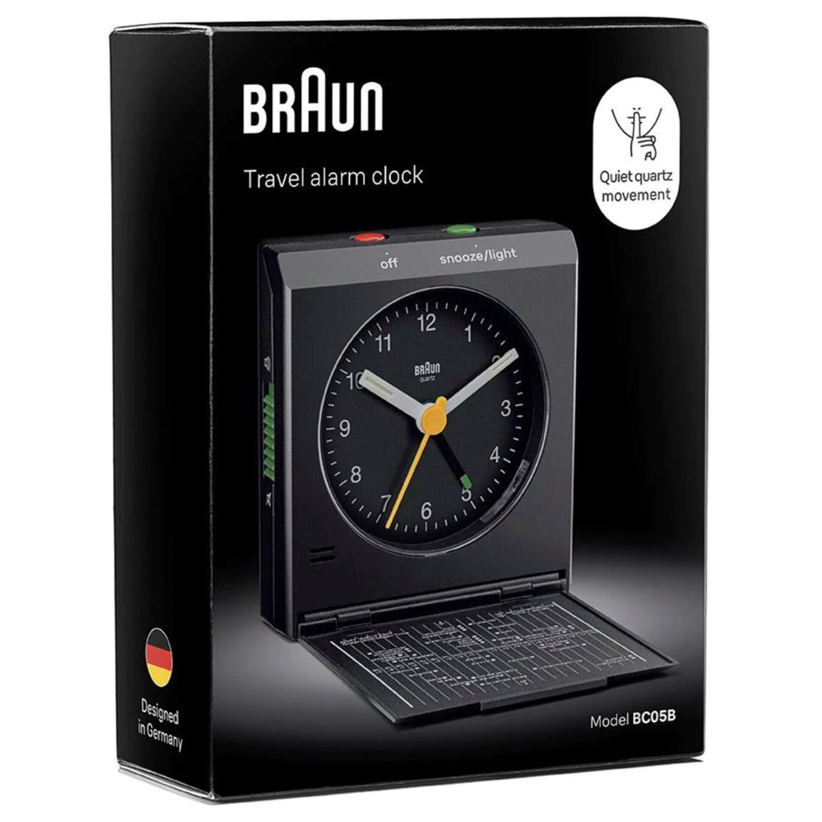 Schwarze BRAUN Reise-Digitaluhr mit aufgeklapptem Deckel und Bedienelementen.