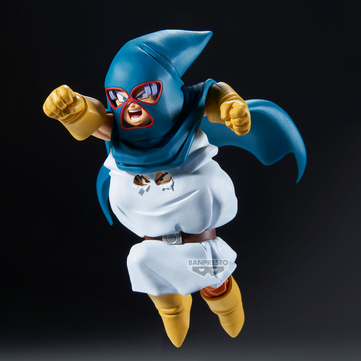 Una figura in tuta blu, guanti e stivali gialli in volo.