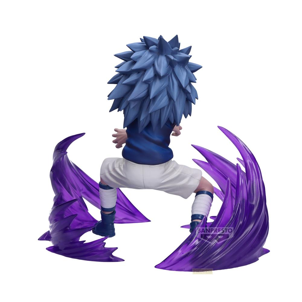 Figura con capelli blu a punta, pantaloncini bianchi, maglia blu ed effetti viola.