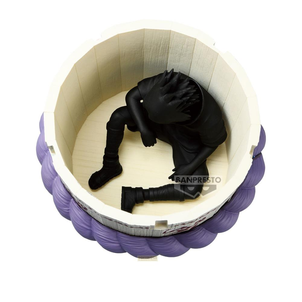 Una figura nera è accovacciata dentro un contenitore rotondo, viola e bianco.