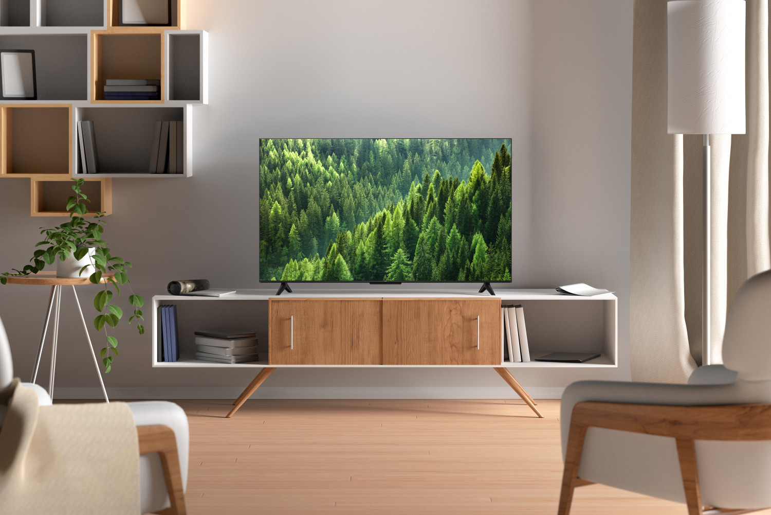 Nowoczesny salon z telewizorem wyświetlającym scenę leśną.