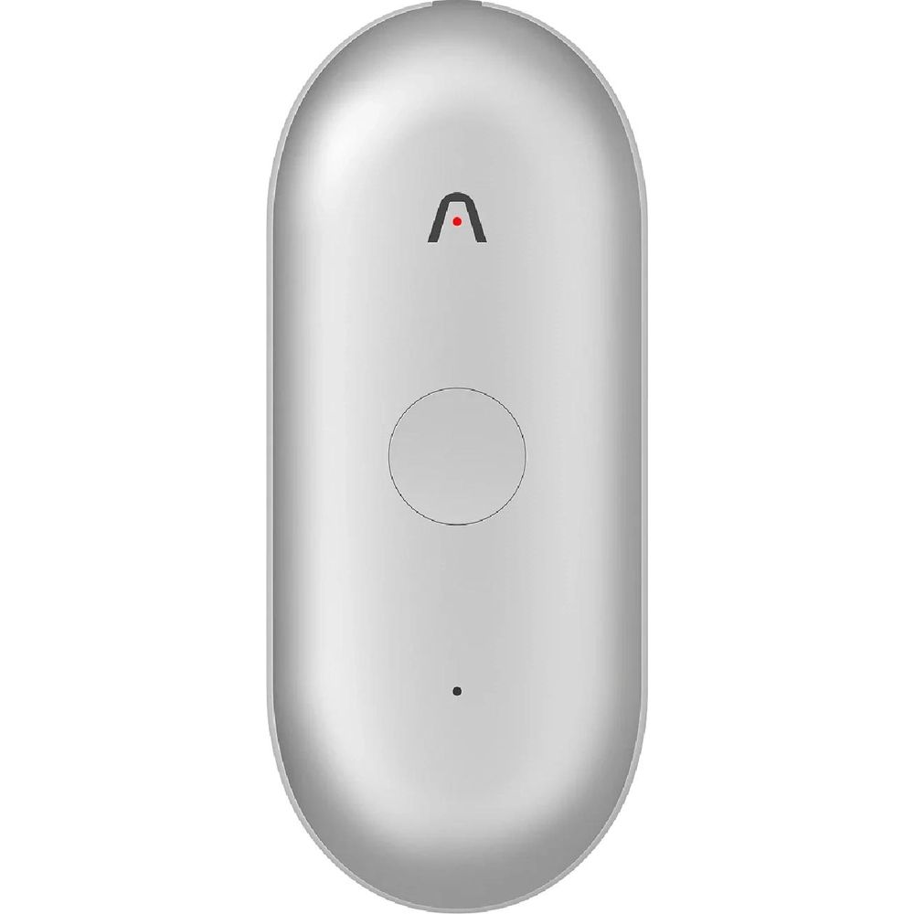 Ein silbernes, pillenförmiges Gerät mit einem schwarzen Kreis und einem roten A-Symbol.