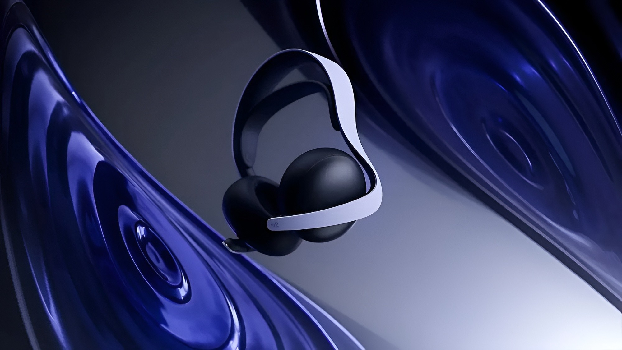 Auriculares negros con banda blanca flotan sobre superficies onduladas azules.