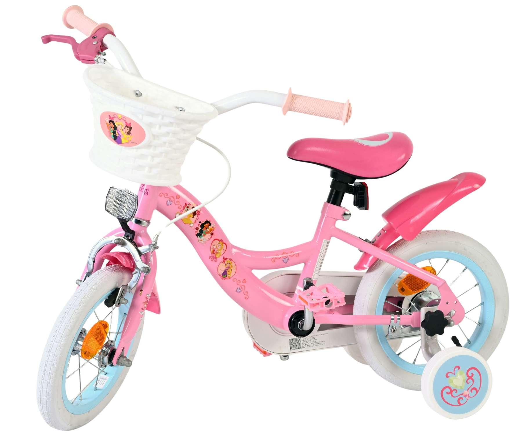 Ein pinkes Kinderfahrrad mit Stützrädern, Korb und Prinzessinnen-Motiven.