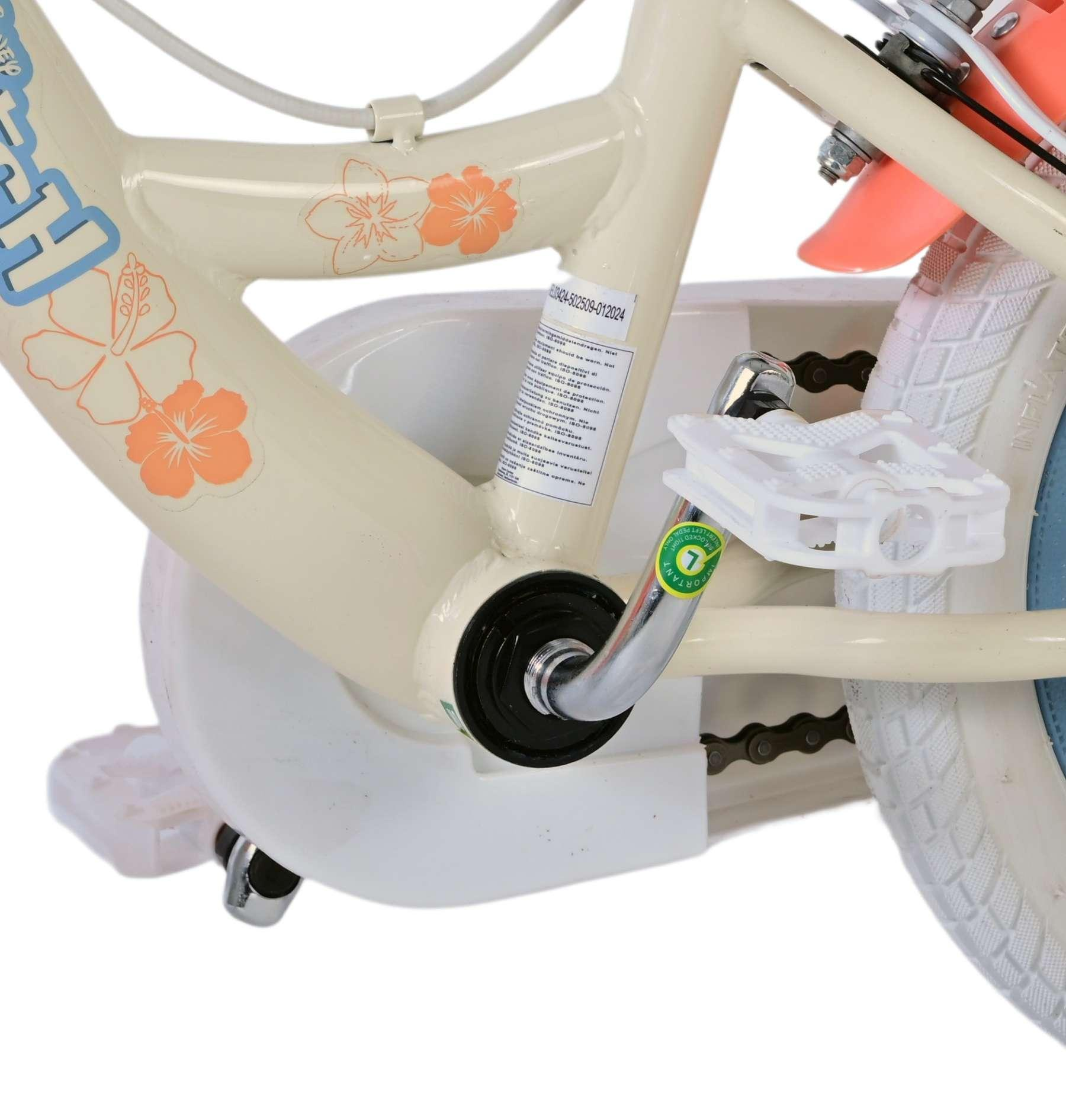 Beiger Fahrradrahmen mit Blumenaufklebern, weißem Pedal und Kette.