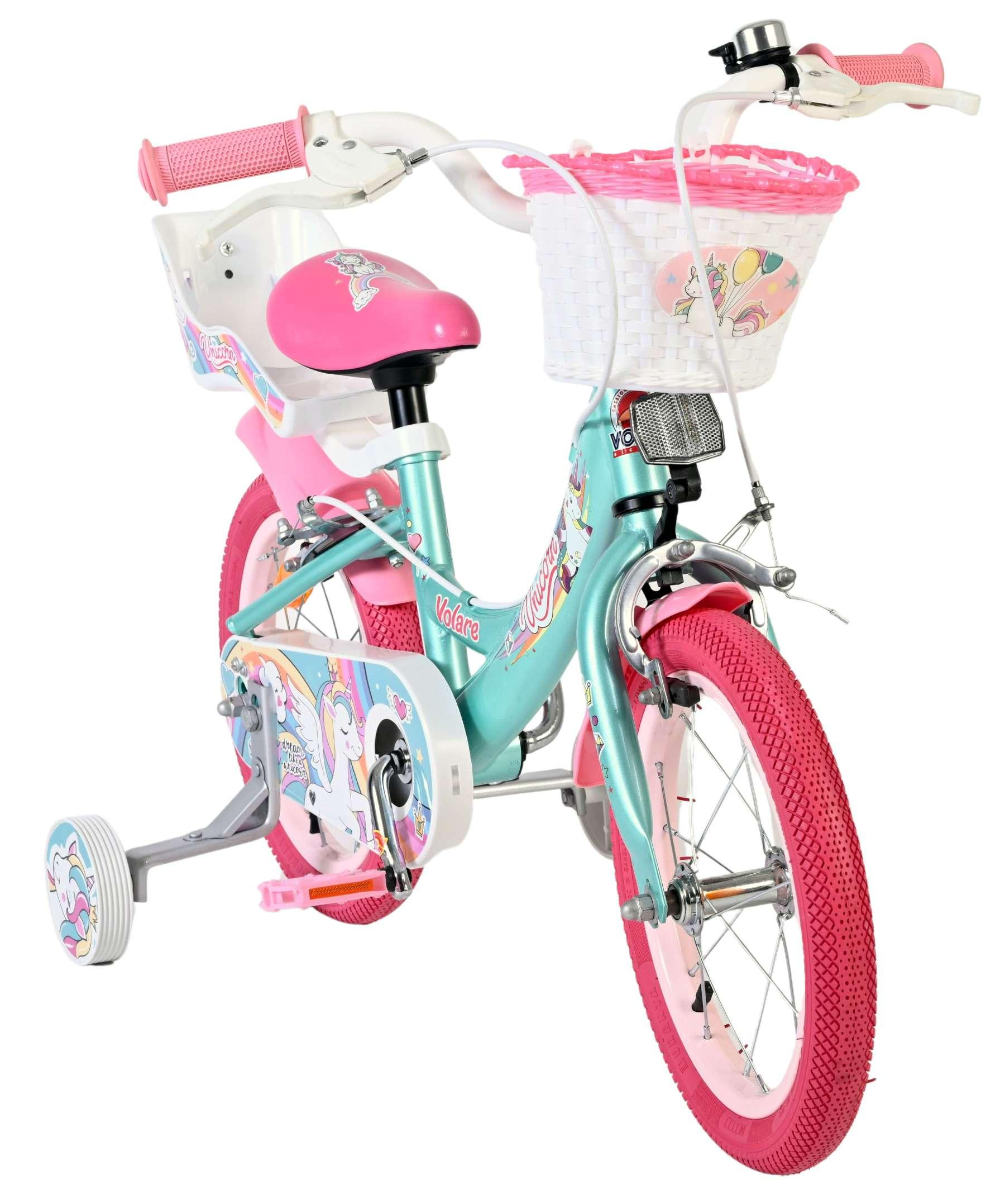 Ein türkisfarbenes Kinderfahrrad mit rosa Akzenten und Einhornmotiven.